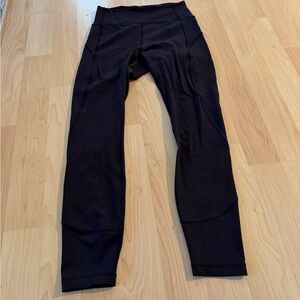 Woman’s black Lululemon leggings